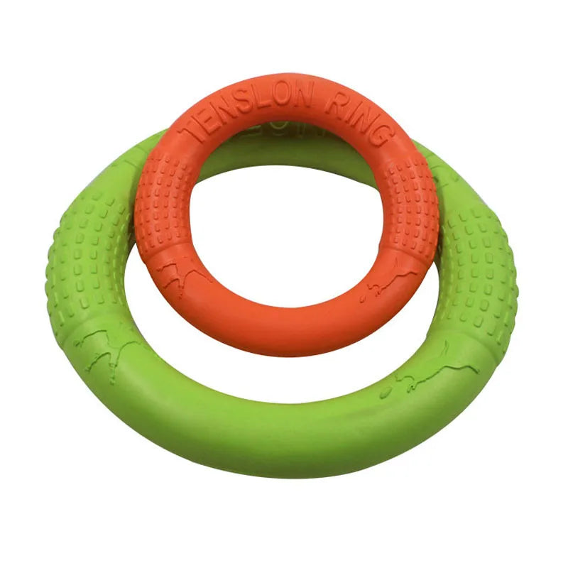 Two EVA Dog Training Ring, one green and one orange, on a white background.