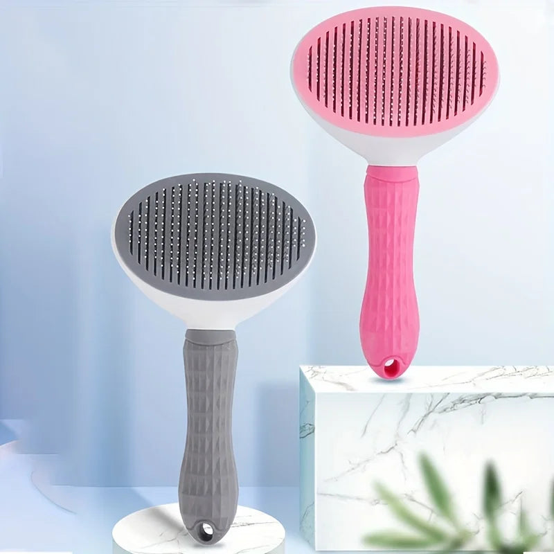 Two pet grooming brushes, one pink and one gray, on a light blue background.