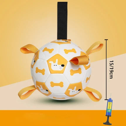 White ball with dog and bone patterns and orange handles on a yellow background