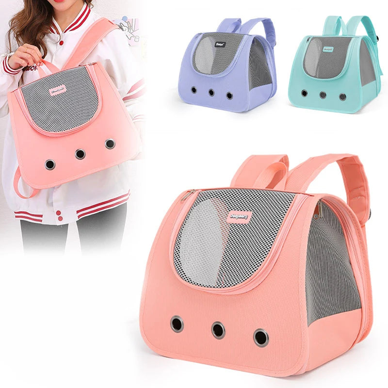 Pet carrier backpack in pink held by a person, with additional carriers in purple and green on a white background.