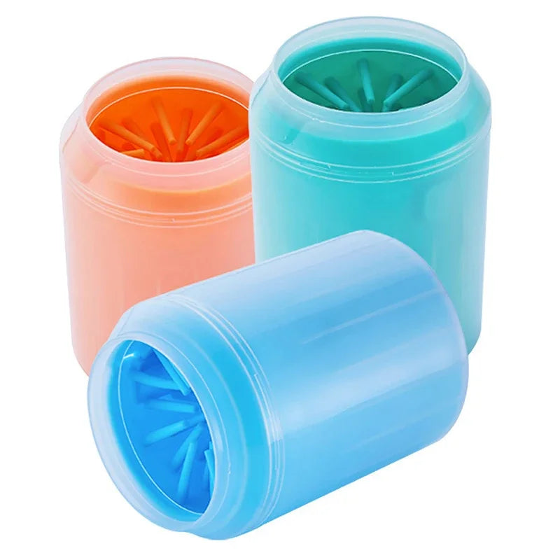 Three colorful plastic soft silicone pet paw cleaner on a white background