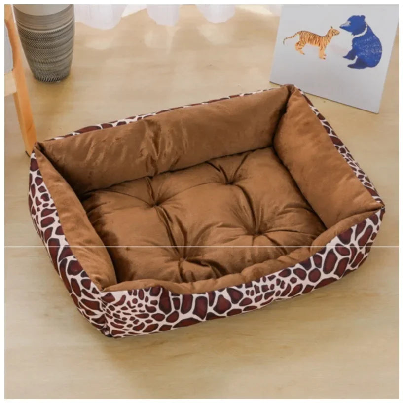 Brown pet bed with giraffe pattern on a wooden floor