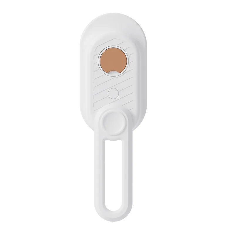 White electronic device with a brown circular component on a white background