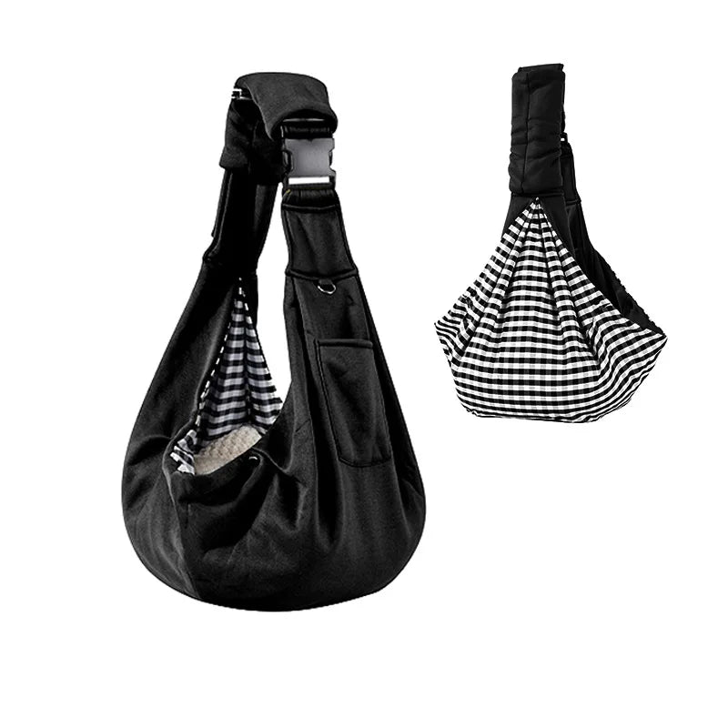 Black pet sling with checkered lining on a white background