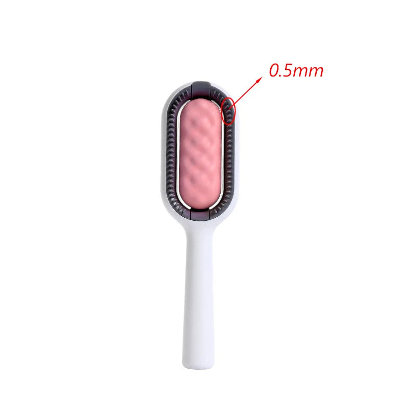 Grooming brush with pink roller and white handle on a white background