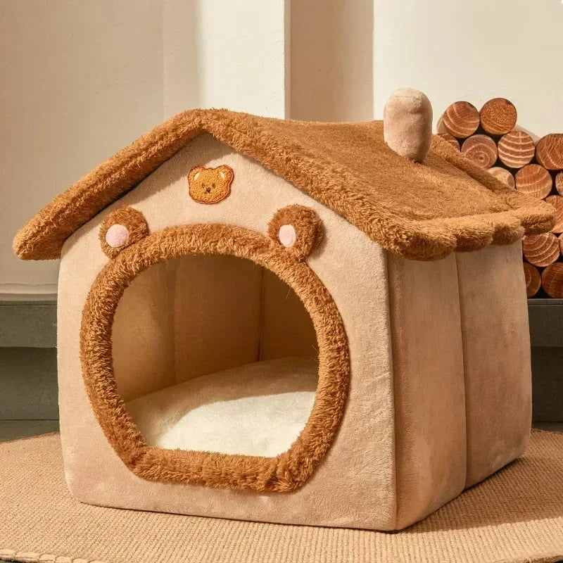 Beige pet house with brown roof and teddy bear design on a neutral background