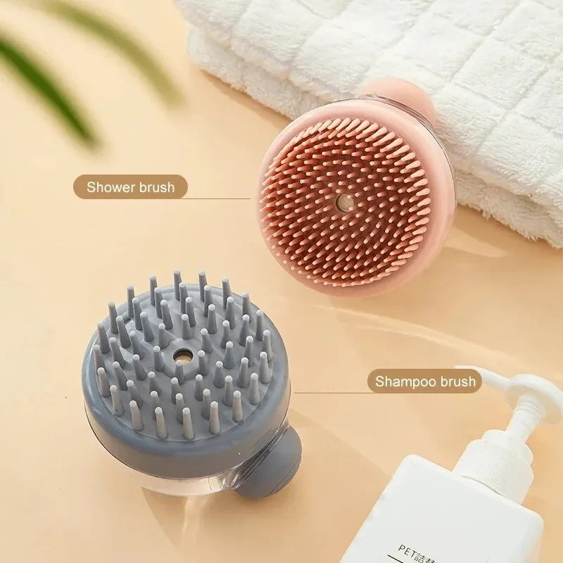 Two dog shower brushes, one pink and one gray, on a beige surface with a white bottle.