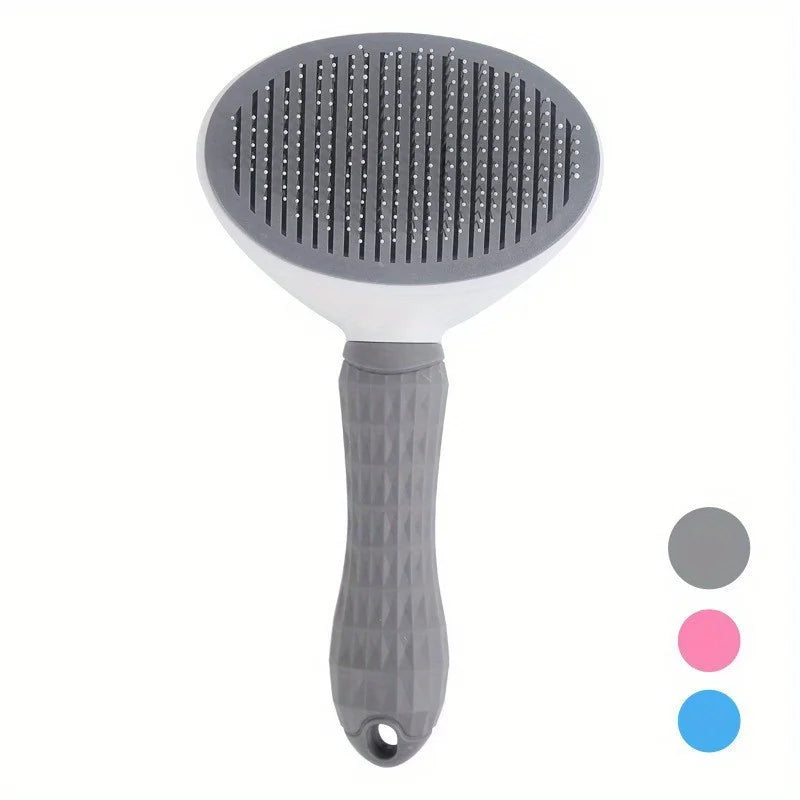 Pet grooming brush with gray bristles and handle on a white background