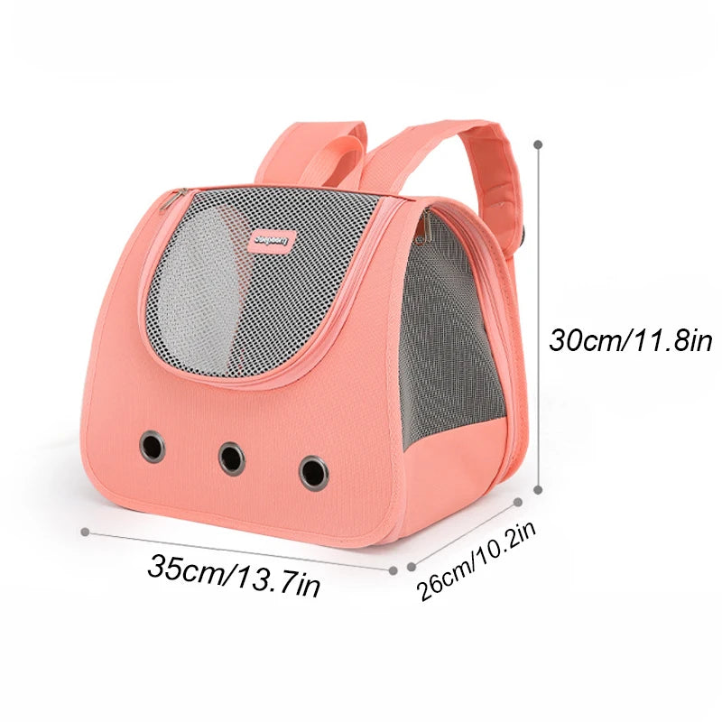 Pink pet carrier with dimensions displayed on a white background