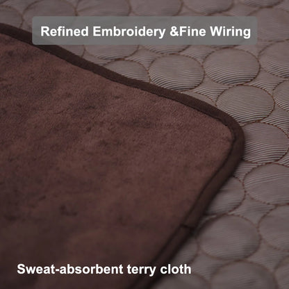 Close-up of a brown bath mat with text about embroidery, wiring, and absorbent quality.