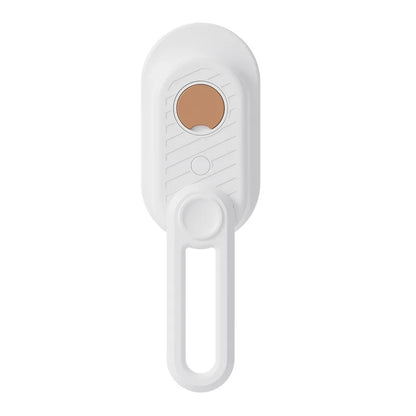 White electronic device with a brown circular component on a white background