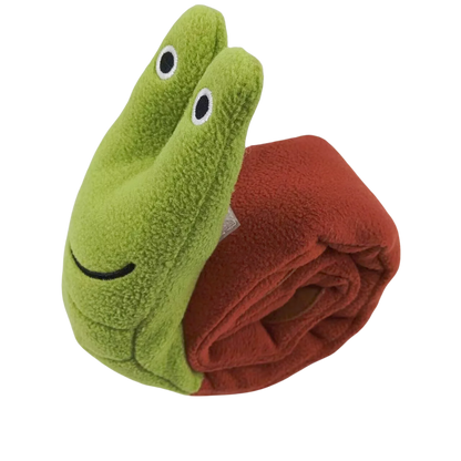 Green plush toy with a face and a red blanket on a white background