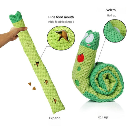 Green snake-shaped toy with features highlighted on a white background