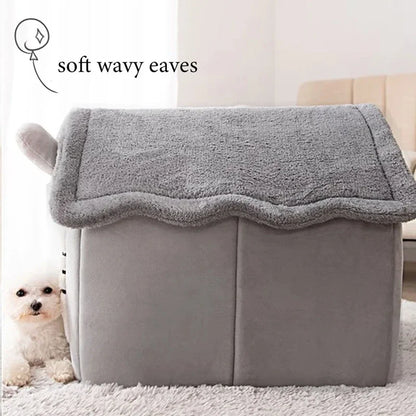 Gray pet bed with wavy eaves and a small white dog sitting next to it.