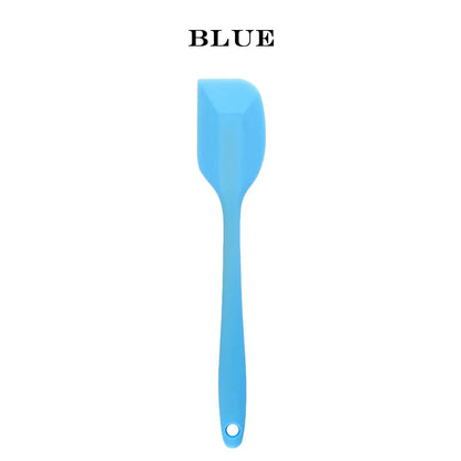 Blue spatula on a white background with 'BLUE' text above it.
